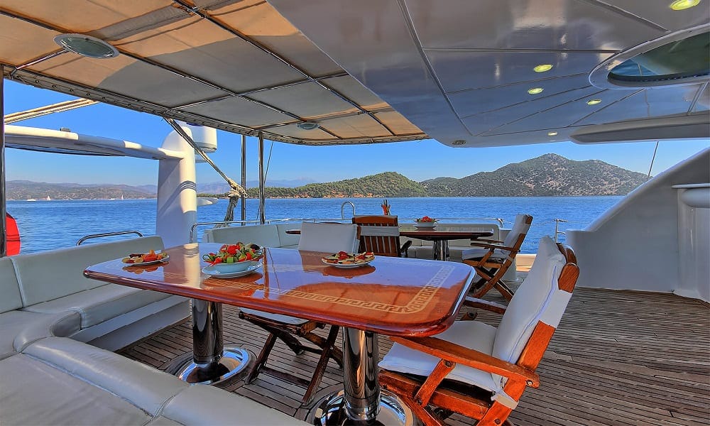 Angelo 2 Gulet dining area set for guests on deck