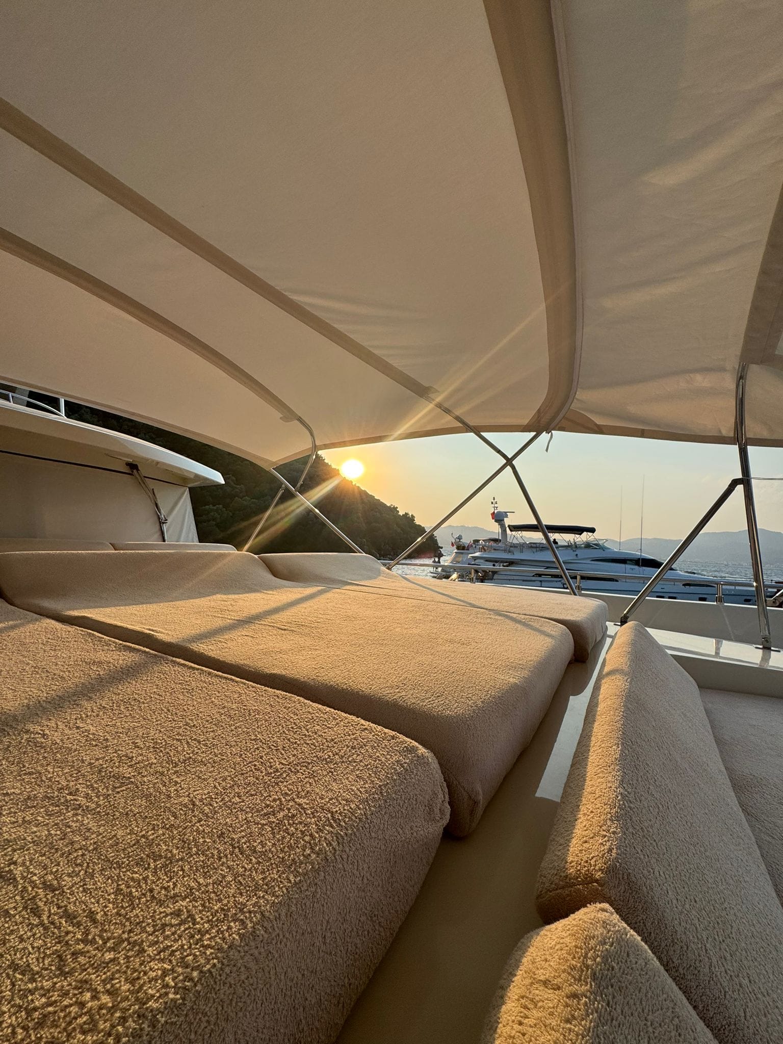 Fore deck sunbathing cushions and towels