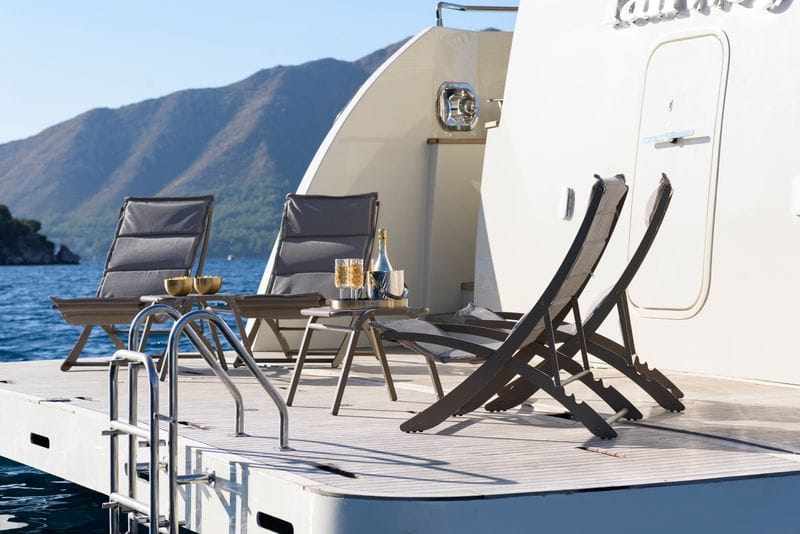 Fore deck sunbathing cushions and towels