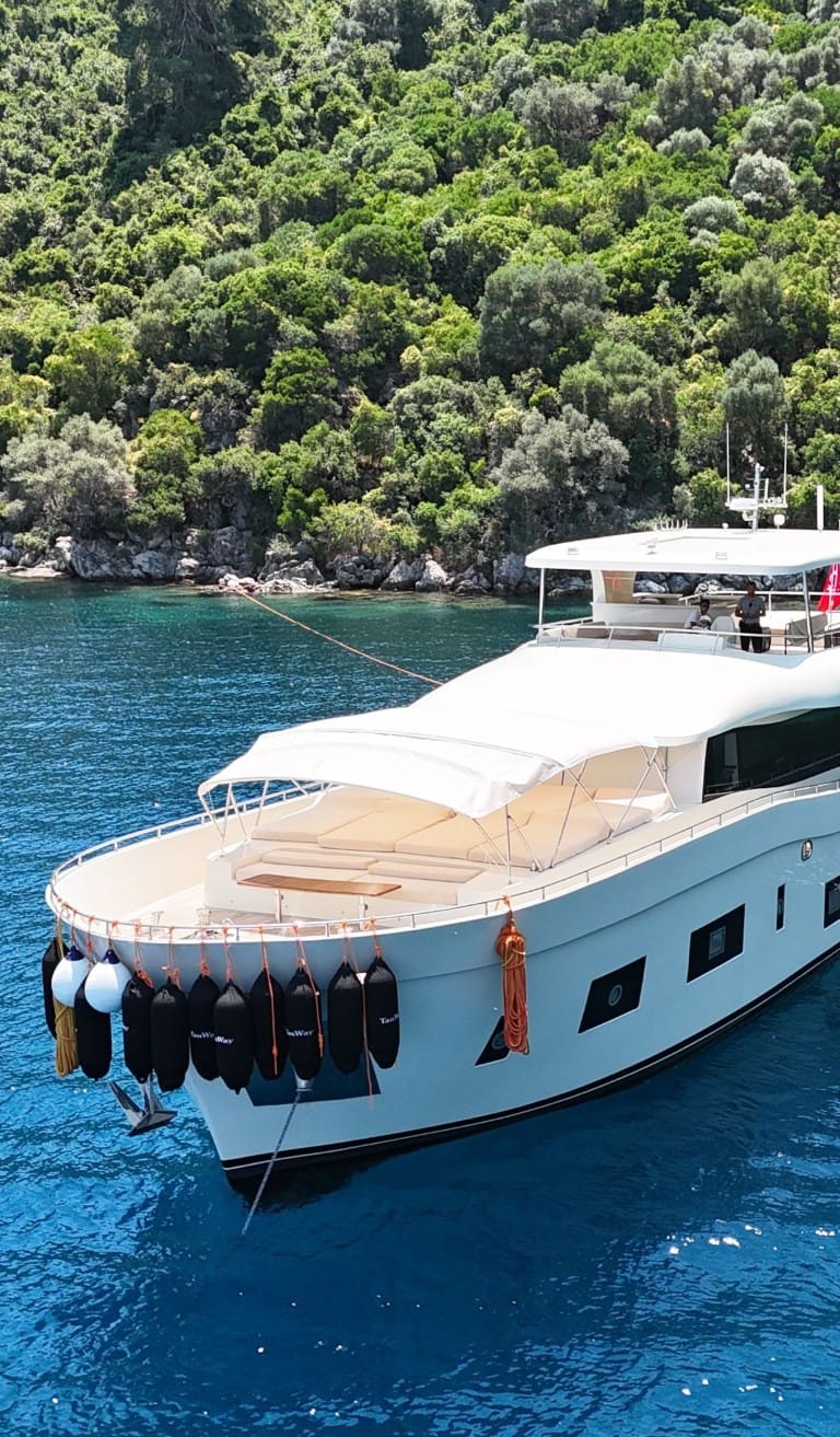 Fore deck sunbathing cushions and towels