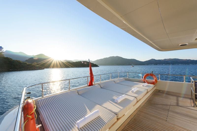 Fore deck sunbathing cushions and towels