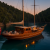 Traditional Turkish gulet anchored in a turquoise bay near Göcek at sunset with guests relaxing on deck and crew preparing food